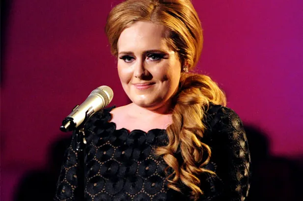 Adele a slăbit 20 de kilograme și arată fabulos într-o rochie de satin