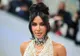 Kim Kardashian s-a acoperit cu 50.000 de perle pentru Gala Met